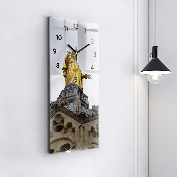 Modern vertical wall clock Statue of the Virgin Mary in Lyon