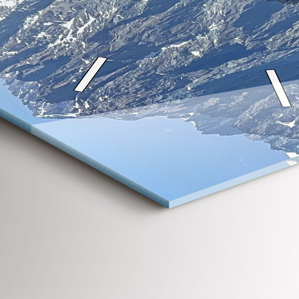 Modern vertical wall clock Alps Mountains in Winter