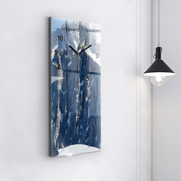 Modern vertical wall clock Alps Mountains in Winter