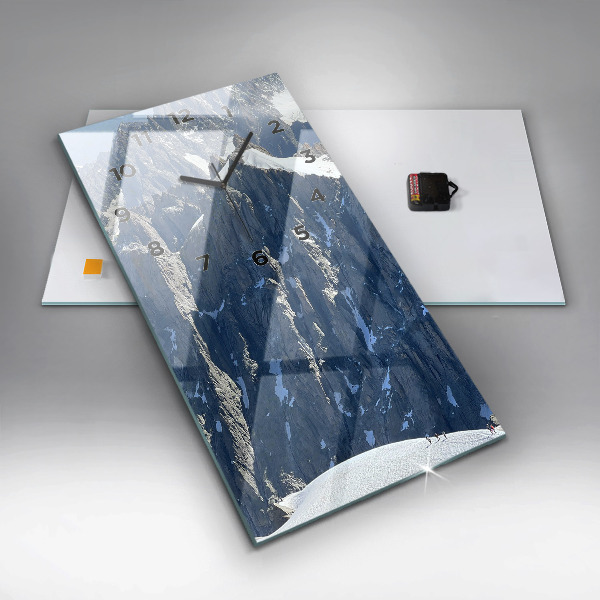 Modern vertical wall clock Alps Mountains in Winter