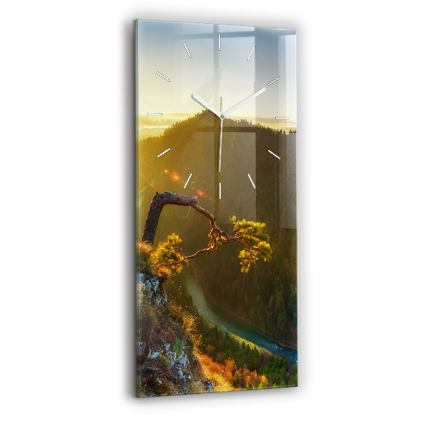 Modern vertical wall clock Sunset over the mountains