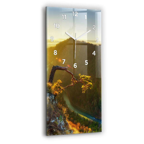 Modern vertical wall clock Sunset over the mountains