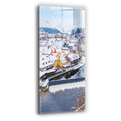 Modern vertical wall clock Panorama of the city in winter