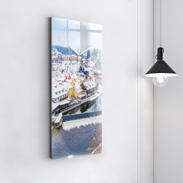 Modern vertical wall clock Panorama of the city in winter