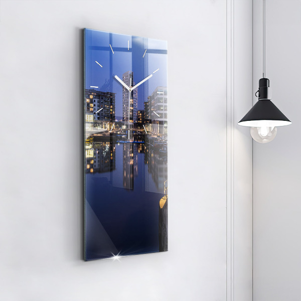 Modern vertical wall clock The city lit up at night