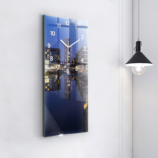 Modern vertical wall clock The city lit up at night