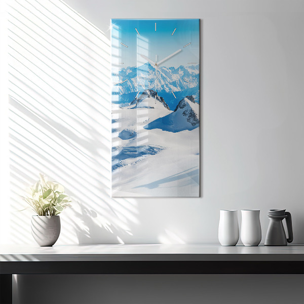 Modern vertical wall clock Skier in the Alps