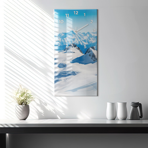 Modern vertical wall clock Skier in the Alps