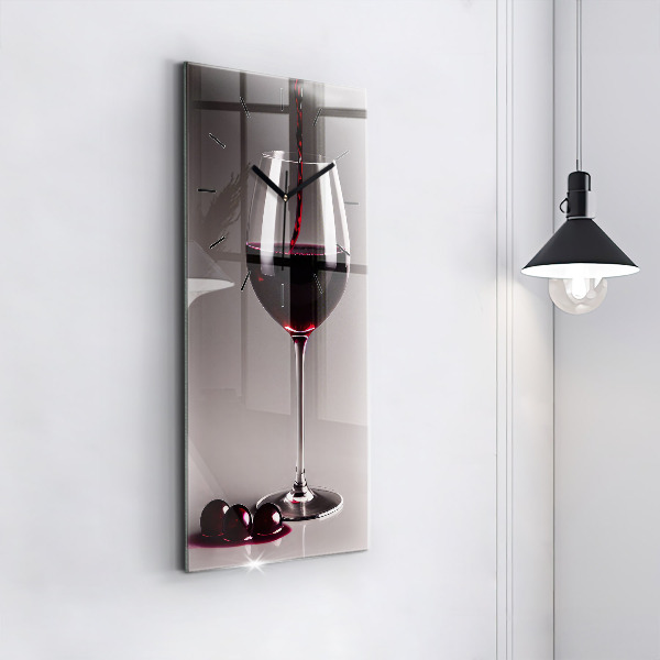 Modern vertical wall clock A glass of red wine