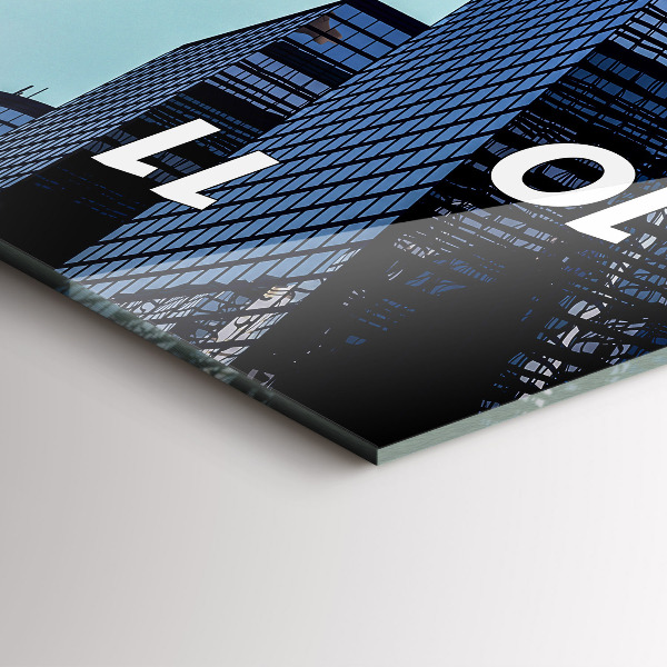 Modern vertical wall clock Airplane over buildings