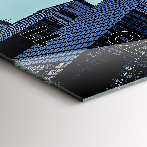 Modern vertical wall clock Airplane over buildings