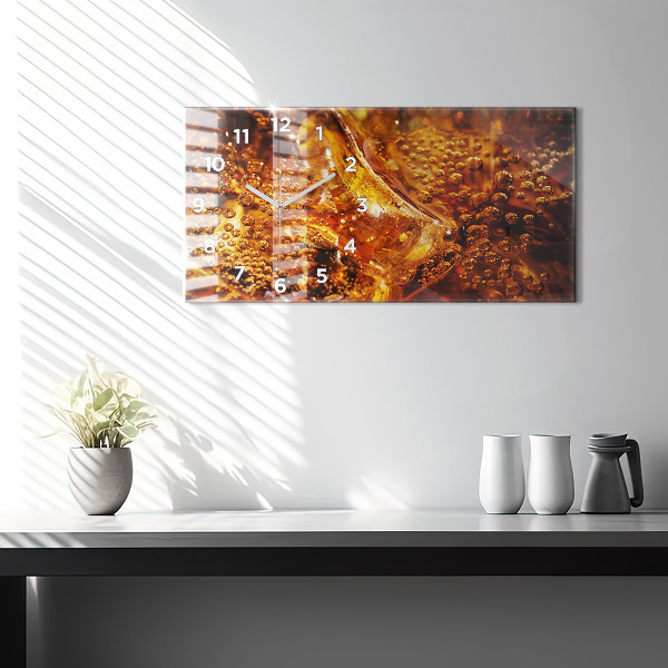 Glass wall clock rectangular Close-up of the drink