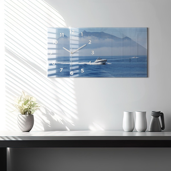 Glass wall clock rectangular A boat floating on the ocean