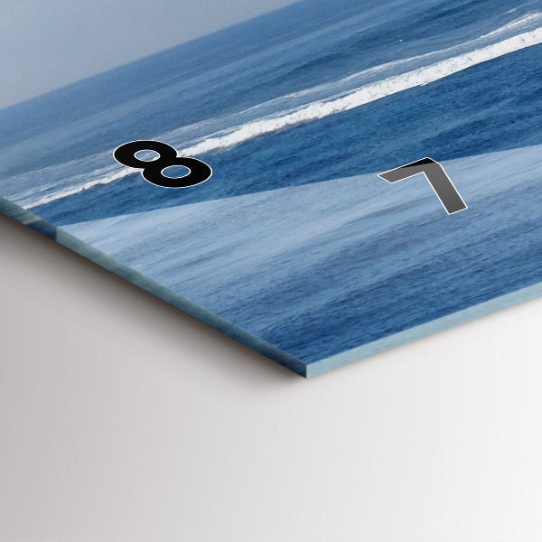 Glass wall clock rectangular A boat floating on the ocean