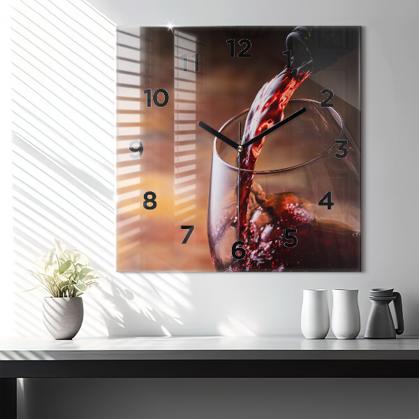 Square glass wall clock A glass of red wine