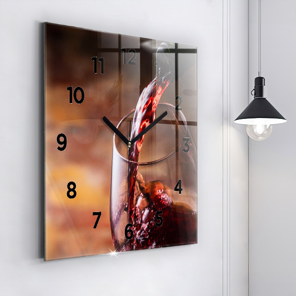 Square glass wall clock A glass of red wine