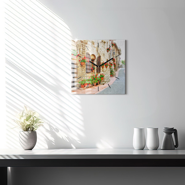 Square glass wall clock A picturesque street