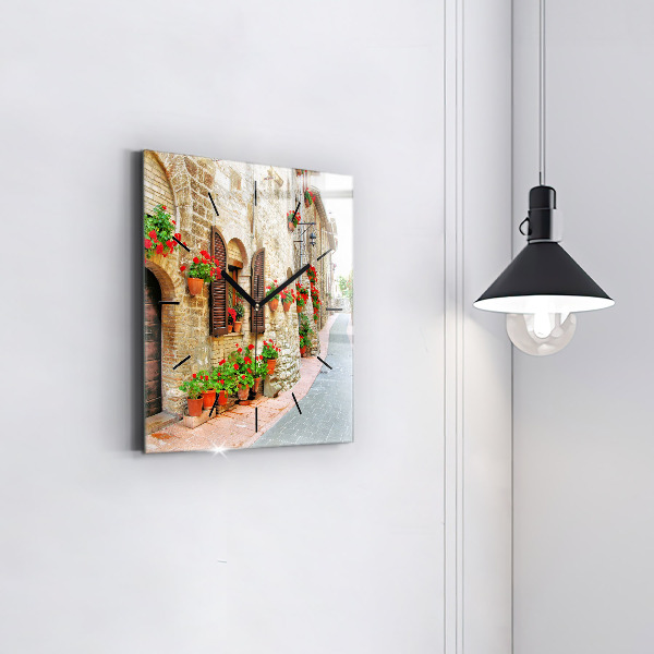 Square glass wall clock A picturesque street