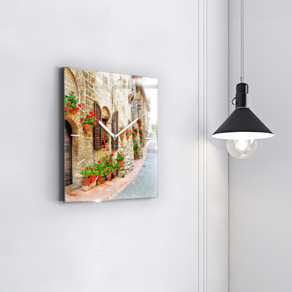 Square glass wall clock A picturesque street