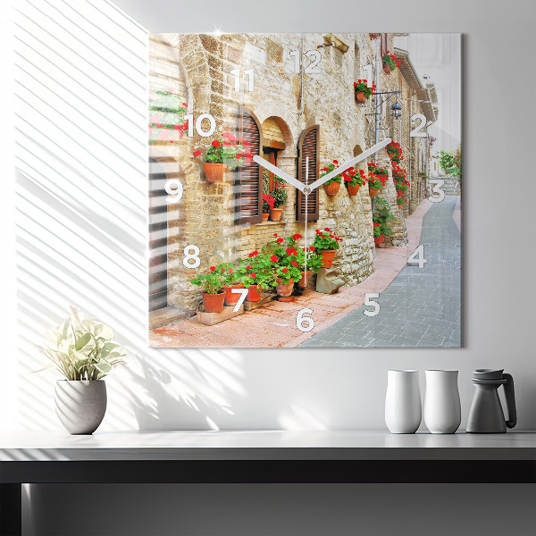 Square glass wall clock A picturesque street