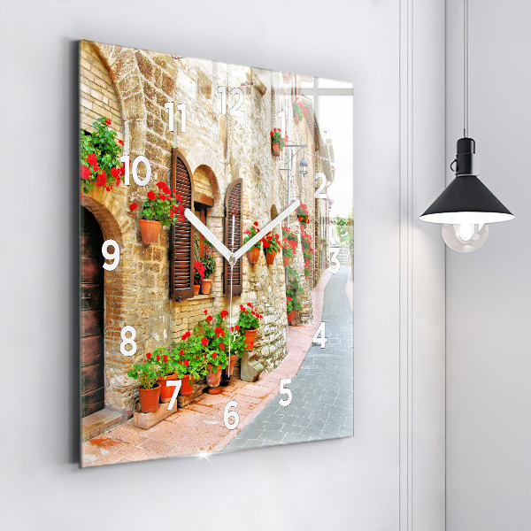 Square glass wall clock A picturesque street