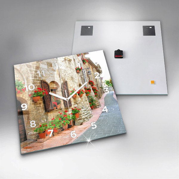 Square glass wall clock A picturesque street