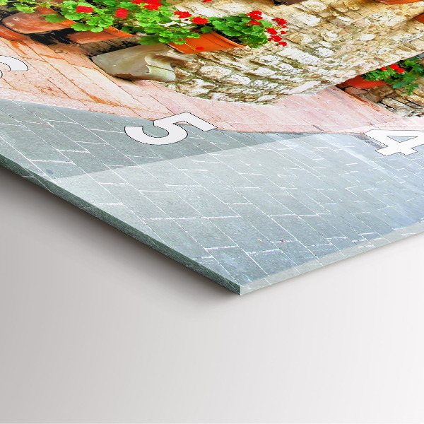 Square glass wall clock A picturesque street