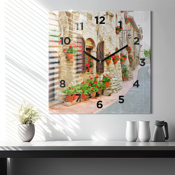 Square glass wall clock A picturesque street