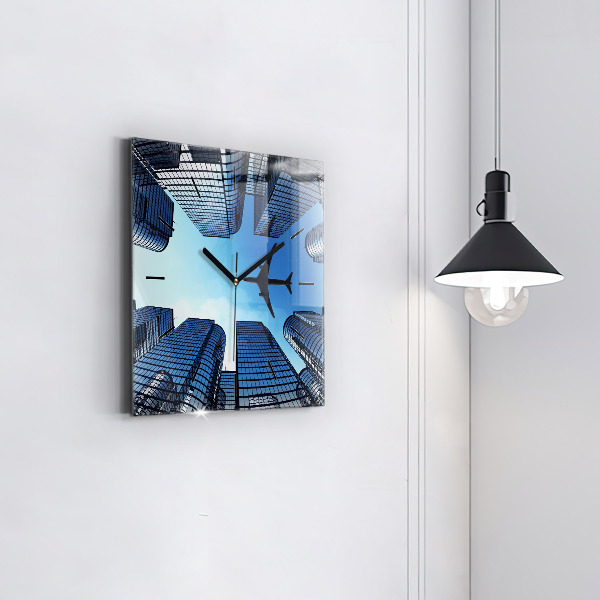 Square glass wall clock Airplane over buildings