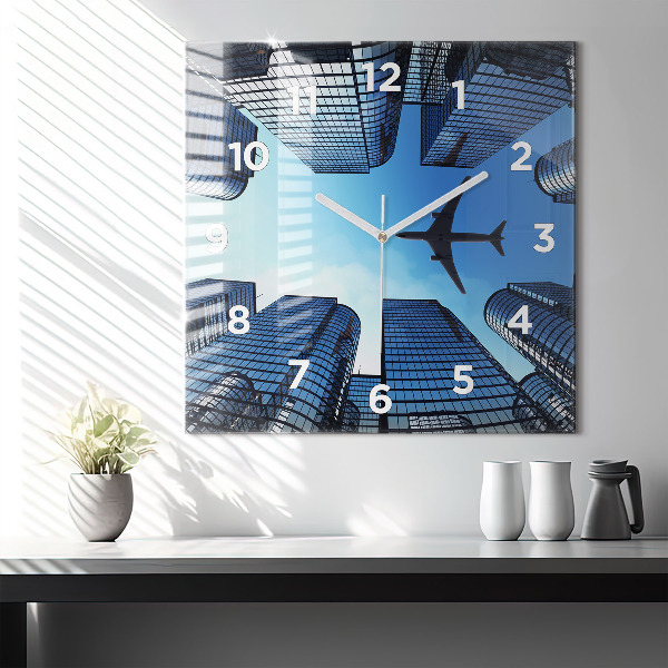 Square glass wall clock Airplane over buildings