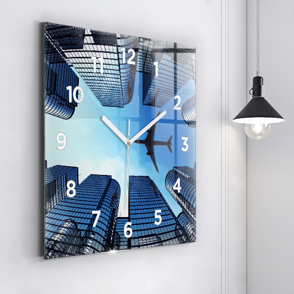 Square glass wall clock Airplane over buildings