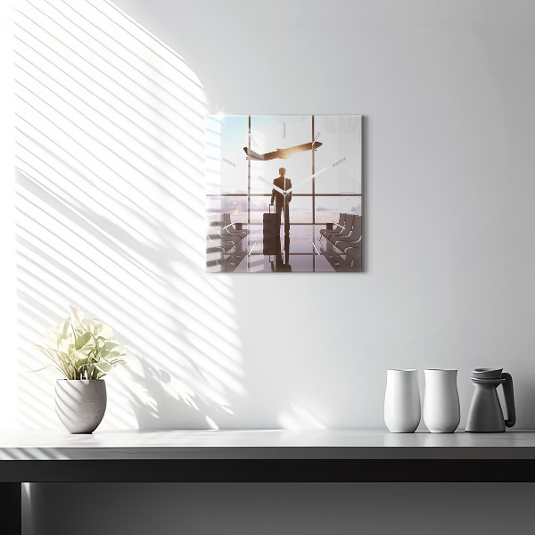 Square glass wall clock Man at the airport