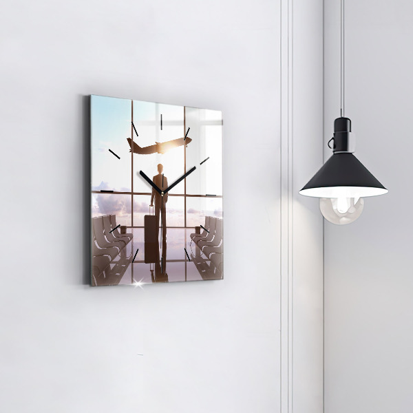 Square glass wall clock Man at the airport