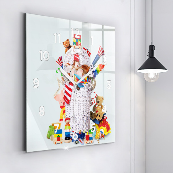 Square glass wall clock Wicker basket with toys