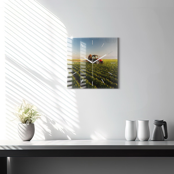 Square glass wall clock Tractor in a farm field