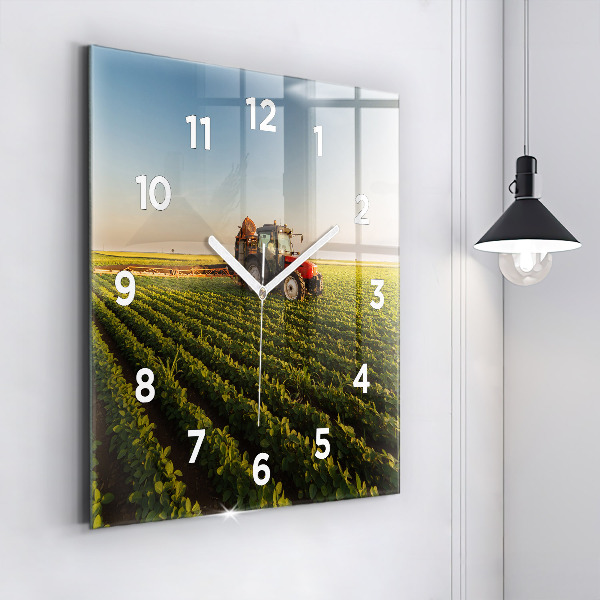 Square glass wall clock Tractor in a farm field