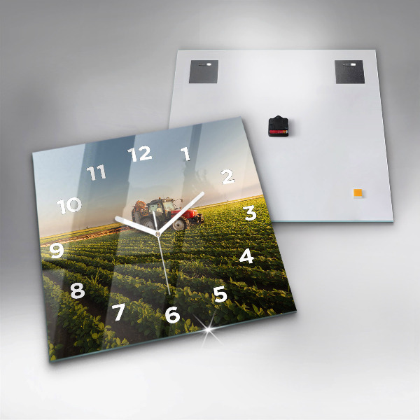 Square glass wall clock Tractor in a farm field