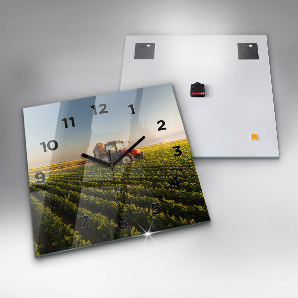 Square glass wall clock Tractor in a farm field