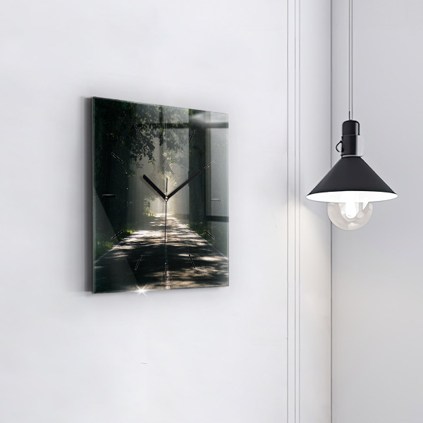 Square glass wall clock Forest road and streaks of sunlight