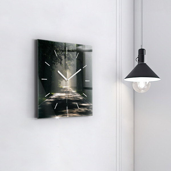 Square glass wall clock Forest road and streaks of sunlight