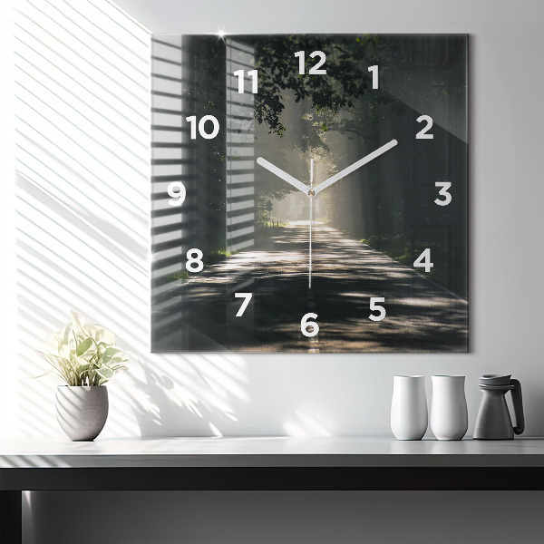 Square glass wall clock Forest road and streaks of sunlight