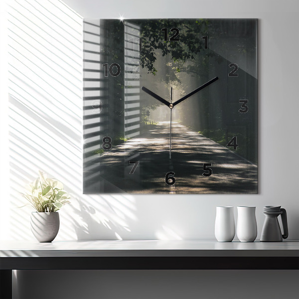 Square glass wall clock Forest road and streaks of sunlight