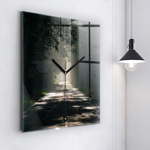 Square glass wall clock Forest road and streaks of sunlight