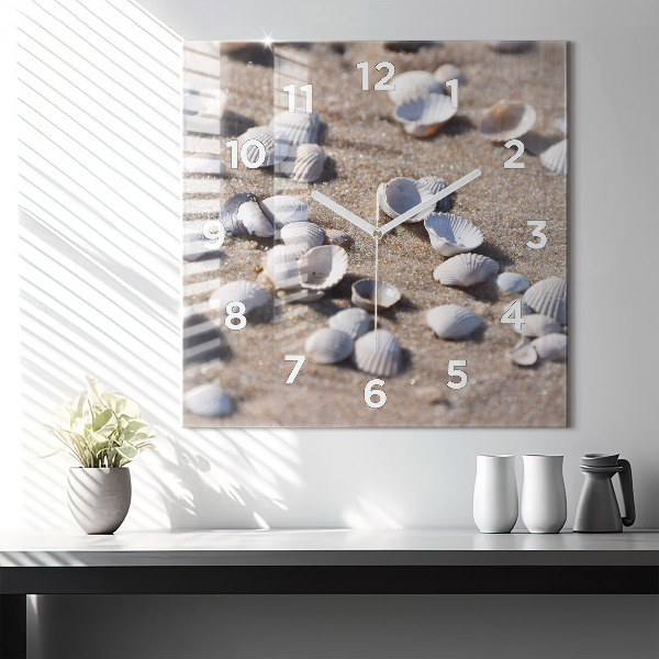 Square glass wall clock Seashells on the beach
