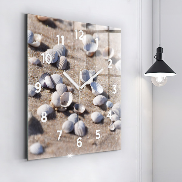 Square glass wall clock Seashells on the beach