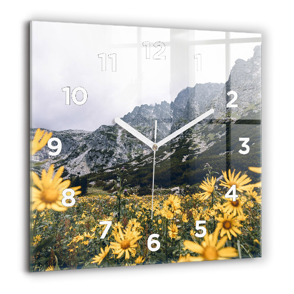 Square glass wall clock Meadow flowers in the mountains