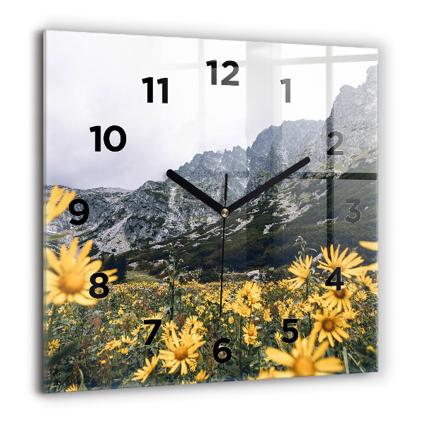 Square glass wall clock Meadow flowers in the mountains