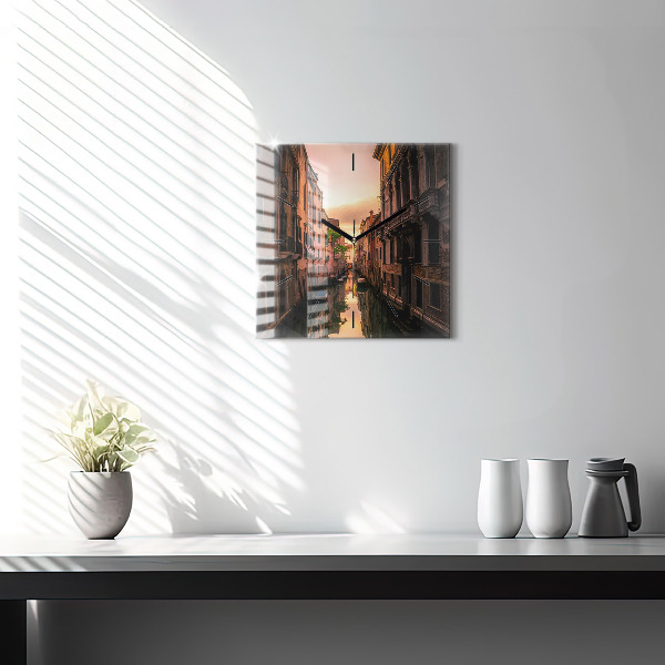Square glass wall clock View of the canal in the city
