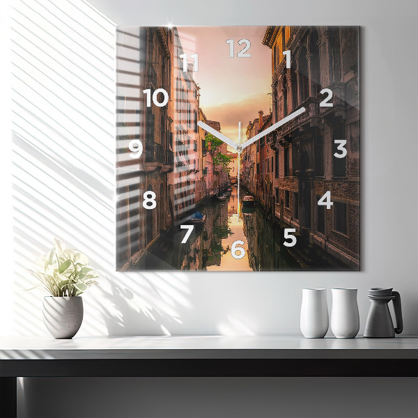Square glass wall clock View of the canal in the city