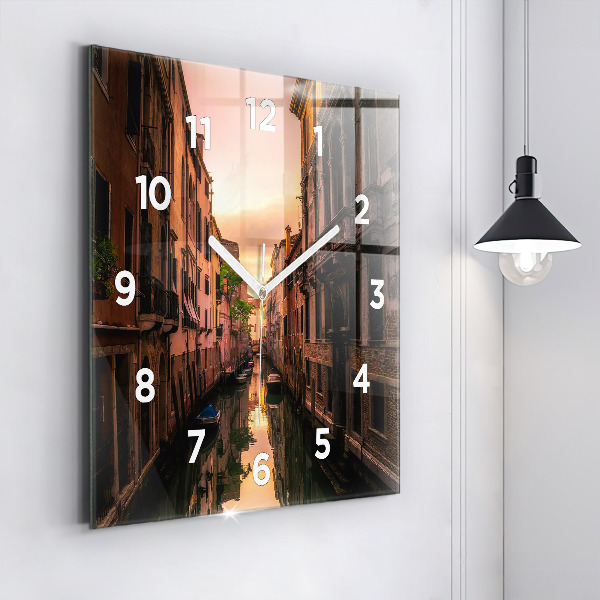 Square glass wall clock View of the canal in the city